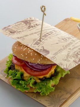 A hamburger in wrapping paper