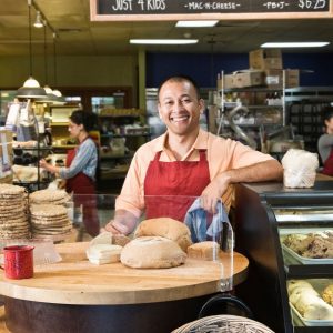 A middle aged man in a bakery 
