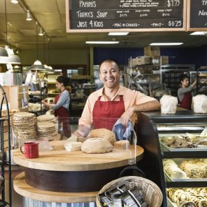 A middle aged man in a bakery 
